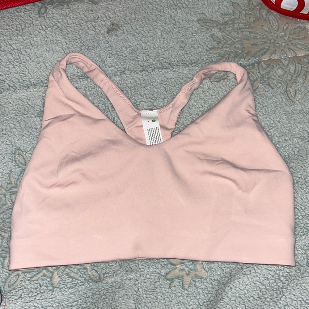 Pink Lululemon sports bra